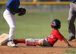 Read more about the article Travel Ball vs. Little League: Helping Your Kid Choose the Right Path